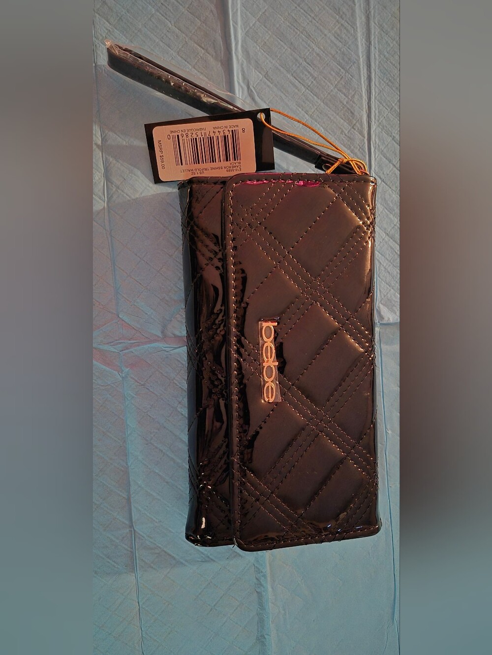 TRIFOLD WALLET,    bebe Quilted  Wallet in Black with Gold-tone Logo,